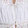 Puuvillainen broderie-koristeltu etuosa