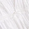 Puuvillainen broderie-koristeltu etuosa