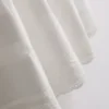 Puuvillainen broderie-midihame