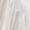 Puuvillainen broderie-midihame