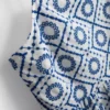 Puuvillainen cutwork-cami-toppi