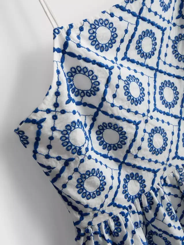 Puuvillainen cutwork-cami-toppi