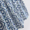 Puuvillainen cutwork-cami-toppi