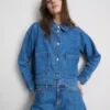 Puuvillainen denimtakki, jossa on paikkatasku