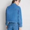 Puuvillainen denimtakki, jossa on paikkatasku