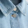Puuvillainen denimtakki, jossa on paikkatasku