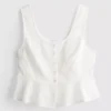 Puuvillainen lyhyt cutwork-cami-toppi