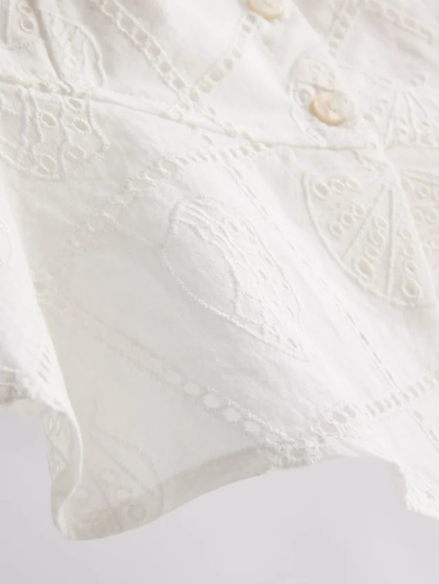 Puuvillainen lyhyt cutwork-cami-toppi