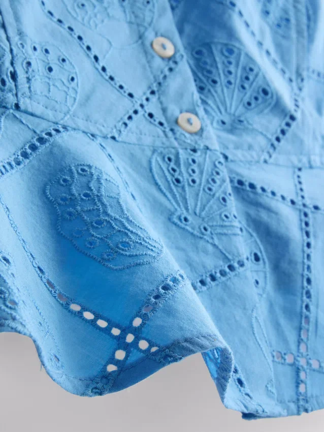 Puuvillainen lyhyt cutwork-cami-toppi