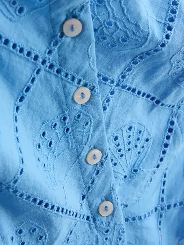 Puuvillainen lyhyt cutwork-cami-toppi