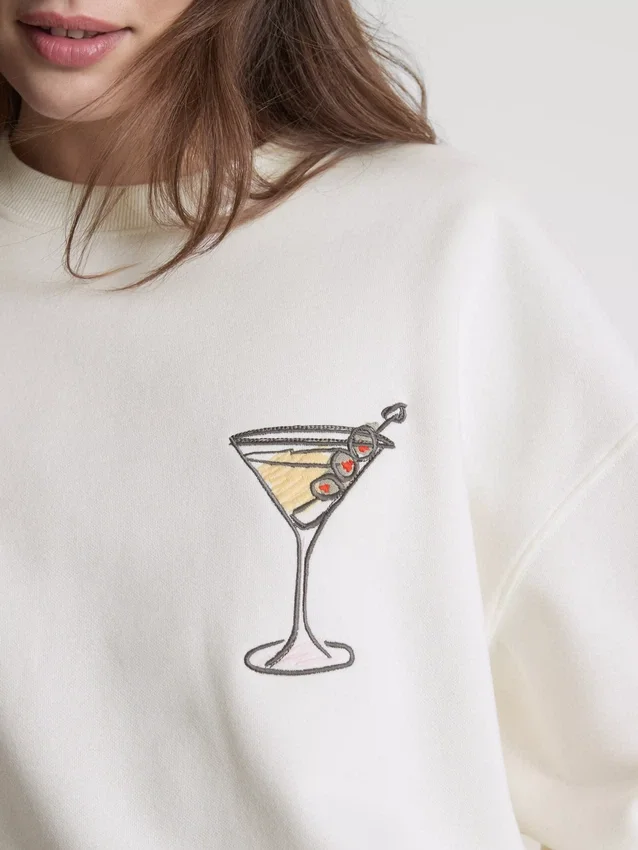 Puuvillapitoinen graafinen Martini-huppari