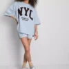 Puuvillapitoinen NYC-huppari, jossa on laskeutuvat hihat