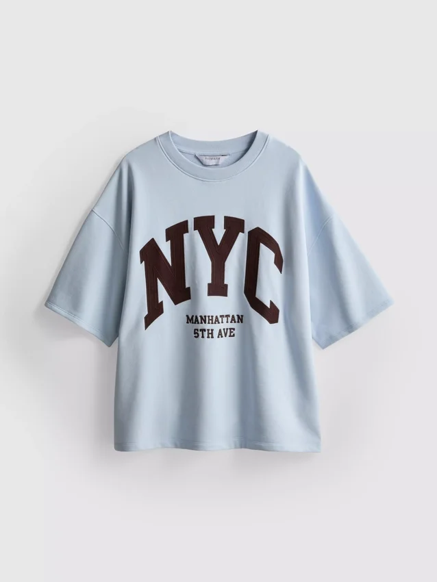 Puuvillapitoinen NYC-huppari, jossa on laskeutuvat hihat