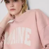 Puuvillapitoinen oversized-tyylinen Maine-huppari