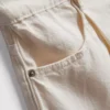 Puuvillapitoiset denim-plisseeratut levenevät shortsit