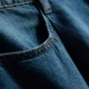 Puuvillapitoiset denim-plisseeratut levenevät shortsit