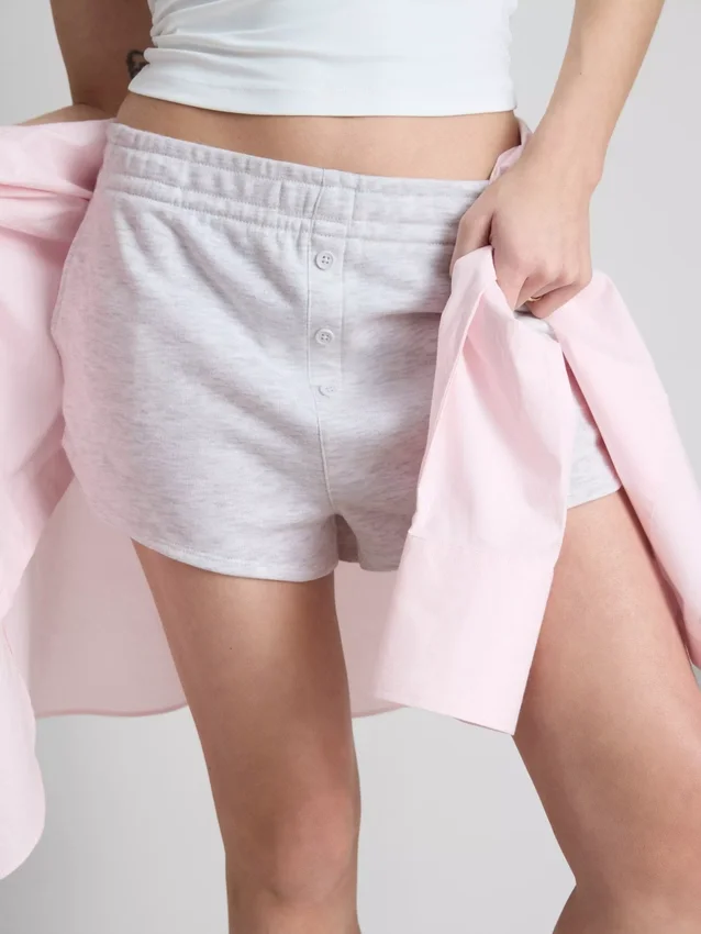 Puuvillapitoiset napilliset jersey-shortsit