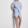 Raidallinen napitettava pyjamat-kauluspaiti