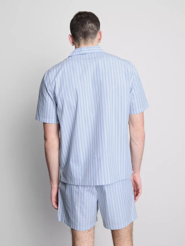 Raidallinen napitettava pyjamat-kauluspaiti