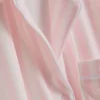 Raidalliset jersey-poikaystävän pyjamat