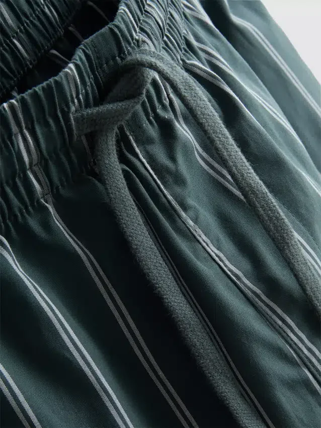 Raidalliset popliiniset pitkät pyjamat