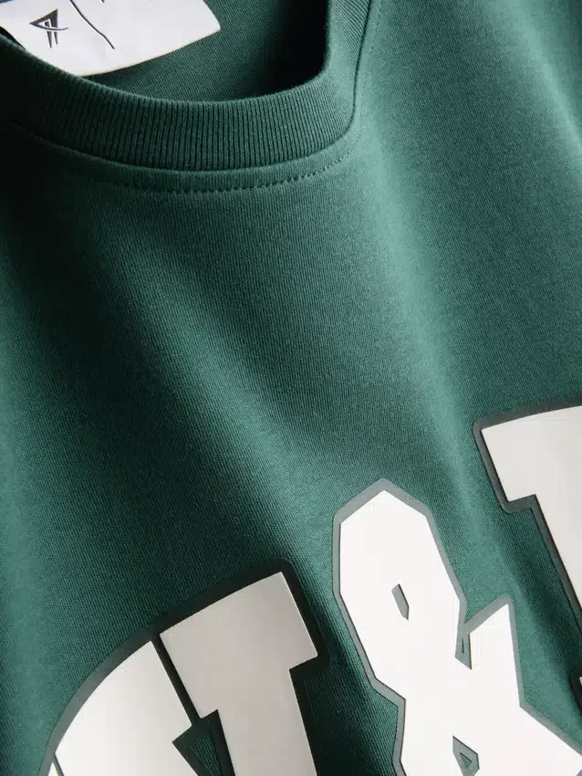 Rento puuvillainen graafinen urheilupaita