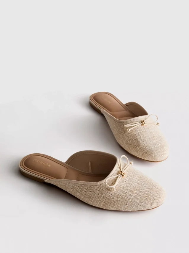 Rusettikoristeiset ballerina-mule-sandaalit