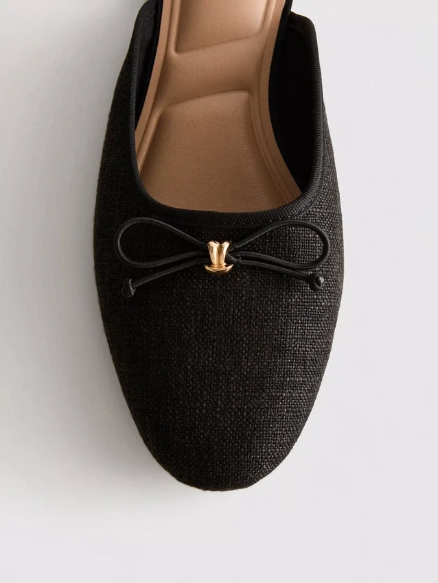 Rusettikoristeiset ballerina-mule-sandaalit