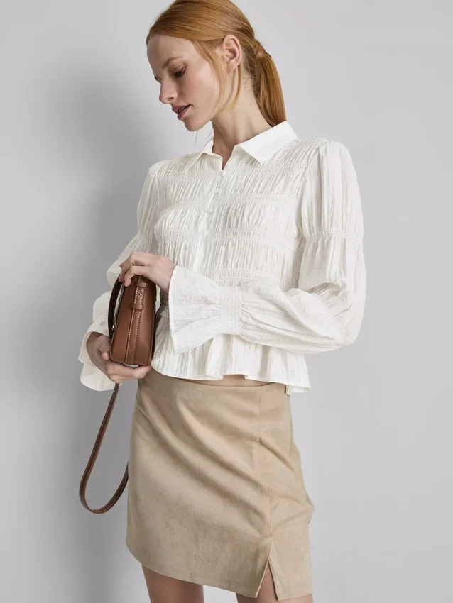 Rypytetty peplum-helmainen pusero