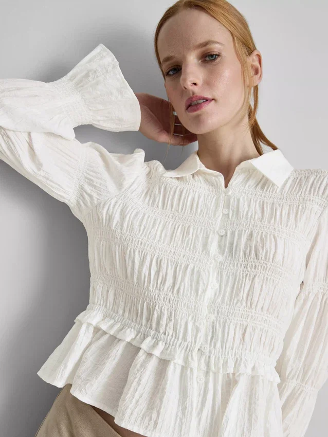 Rypytetty peplum-helmainen pusero