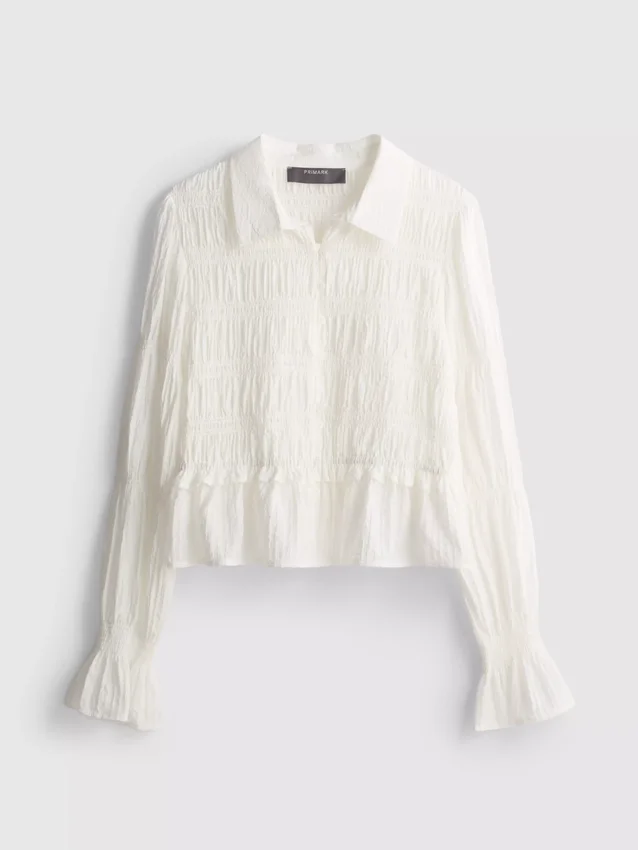 Rypytetty peplum-helmainen pusero