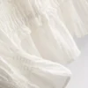 Rypytetty peplum-helmainen pusero