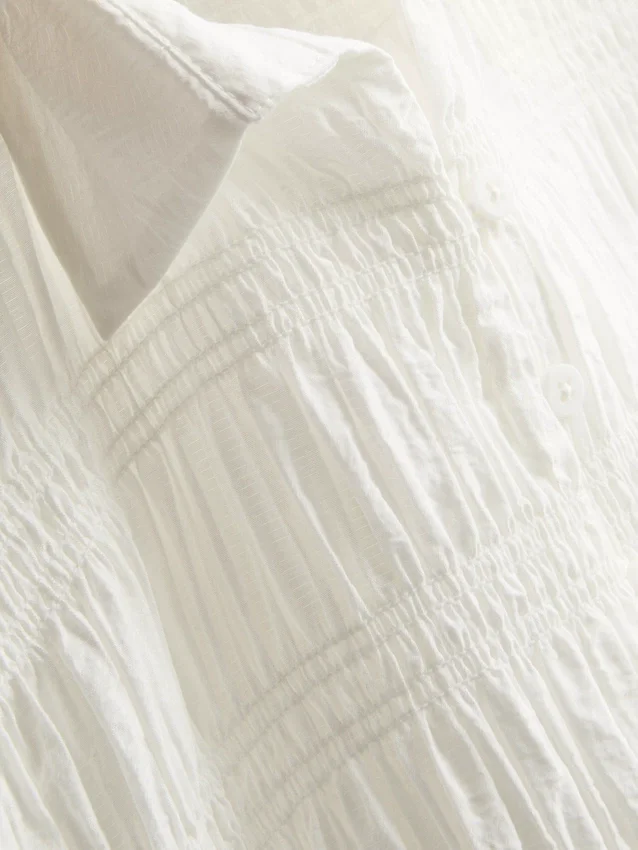 Rypytetty peplum-helmainen pusero