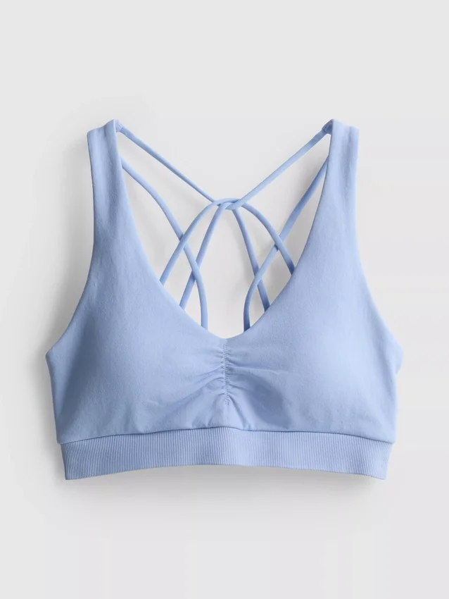 Saumaton olkaimellinen urheilullinen crop-toppi