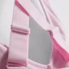 Saumaton, selän takaa ristikkäin menevä urheilullinen crop-toppi