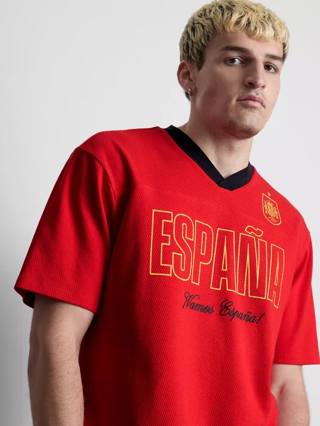 Spain-grafiikalla varustettu jalkapallopaita