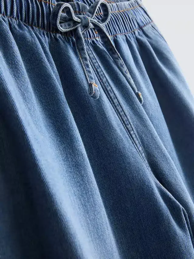Suoralahkeiset denim-collegehousut