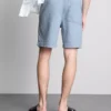 Teksturoidut denimshortsit, joissa on kiristysnauha