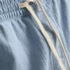 Teksturoidut denimshortsit, joissa on kiristysnauha