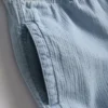 Teksturoidut denimshortsit, joissa on kiristysnauha