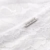 The Edit -kukkakuvioinen pitsitanga