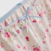 Tiukka cami-toppi ja lyhyet pyjama-shortsit