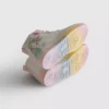 Unicorn-valoa heijastavat korkeavartiset tennarit