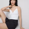 V-kaula-aukkoinen babydoll-top