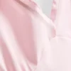V-kaula-aukkoinen babydoll-top