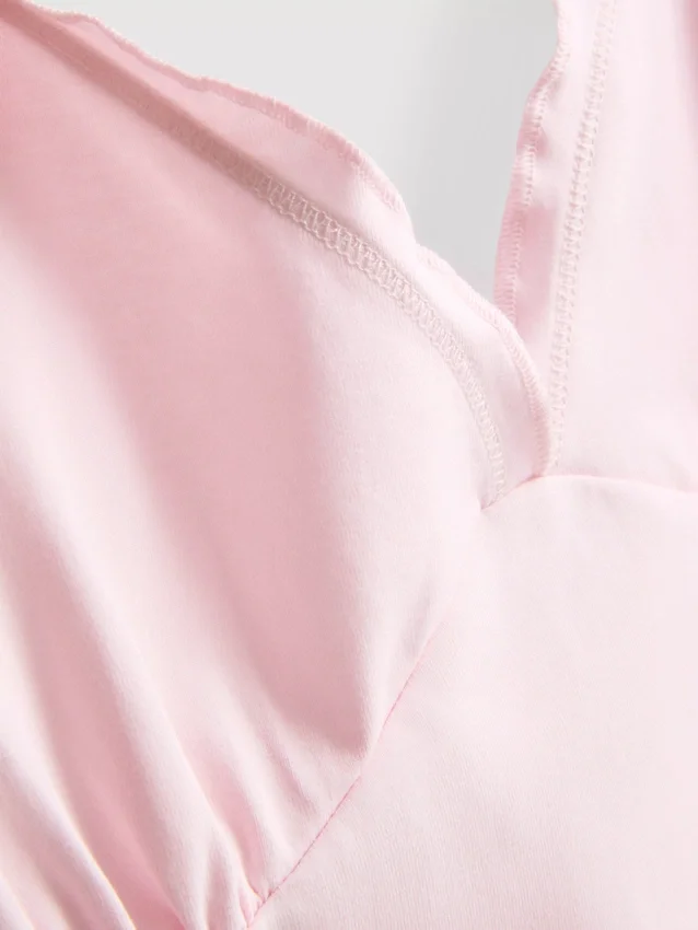 V-kaula-aukkoinen babydoll-top