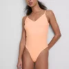 V-kaula-aukkoinen olkaimellinen bodysuit