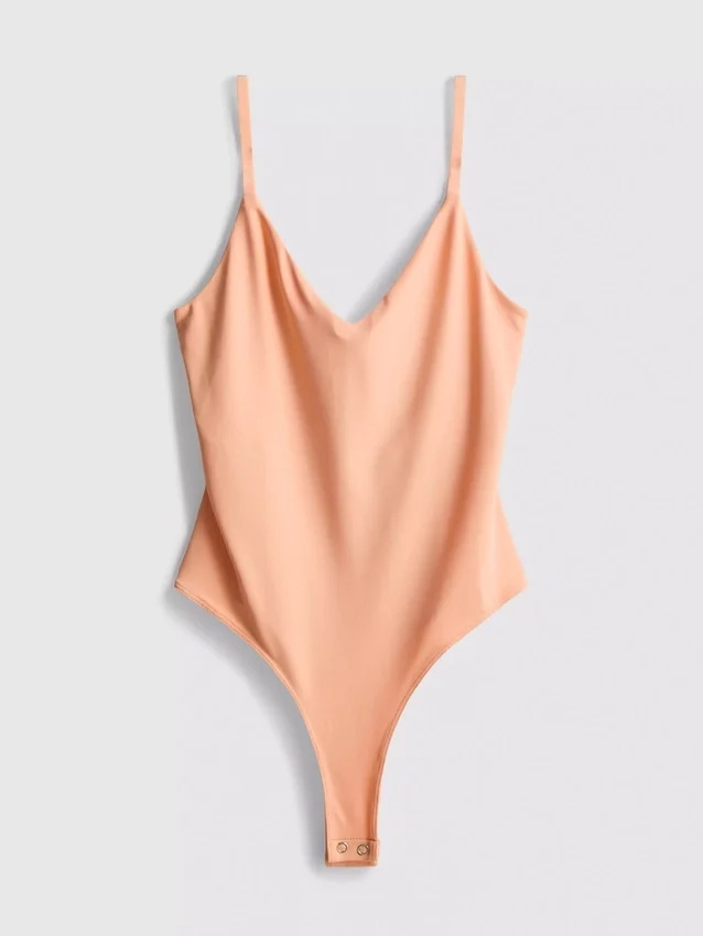 V-kaula-aukkoinen olkaimellinen bodysuit