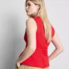 V-kaula-aukkoinen peplum-hihaton toppi