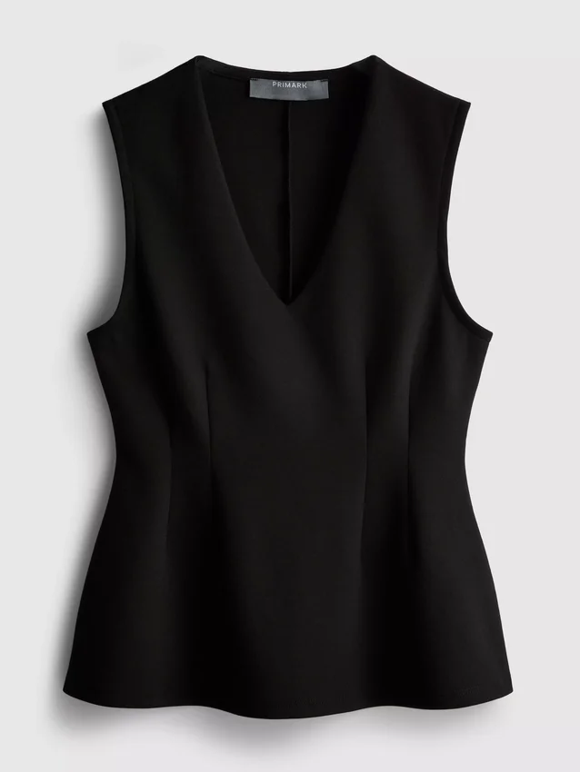 V-kaula-aukkoinen peplum-hihaton toppi